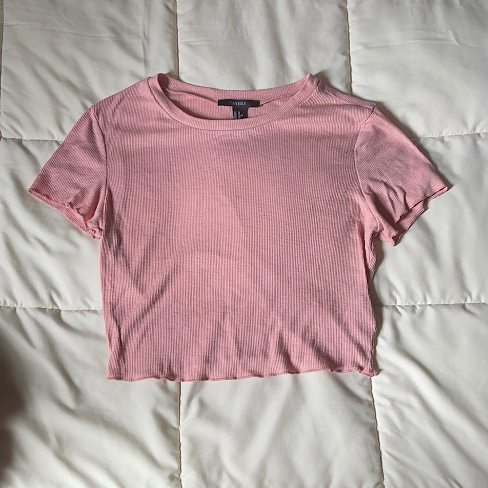 Pink Forever 21 crop top with lettuce edges.